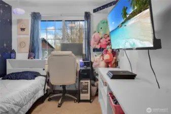 Secondary bedroom on upper level.