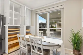 So much storage! Pull outs in lower shelves throughout kitchen