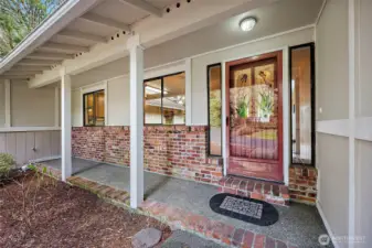 Not like it ever rains here or anything, but the covered entry might come in handy on that rare day that it does.