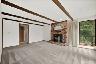 The family room also offers access to the laundry room, and an entrance to the kitchen (not seen here).