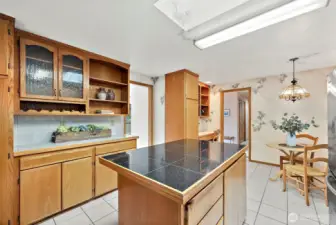 The kitchen is a pretty good size, offering ample counter space and plenty of cabinets.