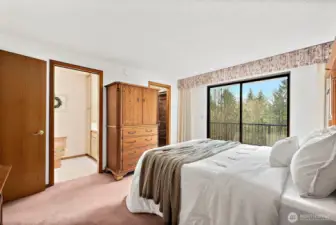 The primary offers access to the deck.