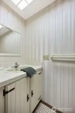 The powder room entered from the laundry room.