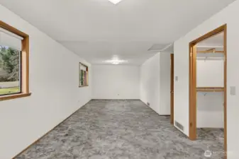 Oversized Primary Suite with nice walk-in closet and attached full bath.