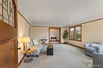 Spacious living room. Wood wrapped windows
