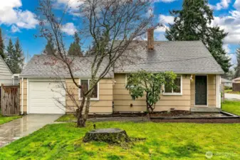 Classic Lovell design set on a sunny Shoreline corner lot walking distance to the Shoreline light rail station and welcoming curb appeal.