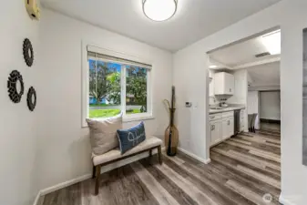 A welcoming entry creates a natural transition between the living spaces and kitchen.