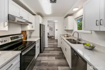 A bright and efficient galley layout balances everyday function with clean modern finishes.