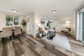 Thoughtful layout creates easy flow between living, dining, and kitchen spaces.