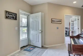 Step into the front entryway, where an inviting open space awaits, complete with a convenient coat closet.