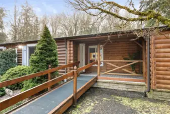 This stellar one-level home will enchant you! It began life as a manufactured home, but has a very spacious stick-built addition which blends seamlessly. The log siding provides a true Northwest feel and look that you'll love, and it blends in beautifully with the gorgeous and private woodsy setting. Hard to believe that this peaceful home is just a short hop to all sorts of shopping and services!