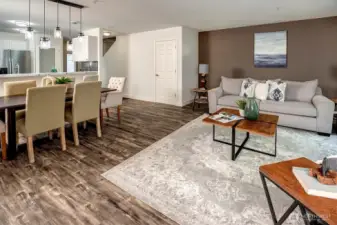 Open-concept main floor where the living, dining, and kitchen areas flow seamlessly together.