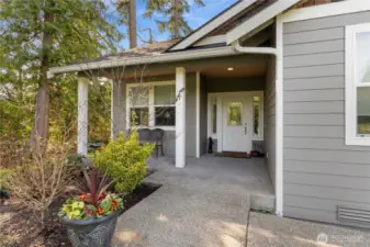 Welcoming covered front porch. Accessible entry with no steps from the driveway.