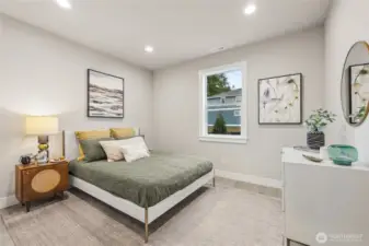 Main Floor Guest Bedroom. Photos are for representational purposes only.  Colors and options may vary.