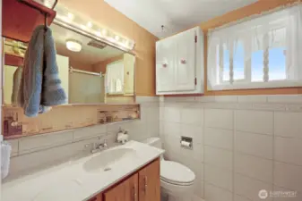 3/4 bath in Hallway between all bedrooms.