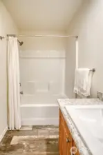 Tub Shower Combo in Primary Suite