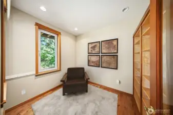 Office off the living room with built in bookcases