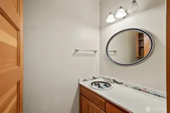 Half bath for guests with custom PNW-inspired tiles