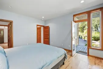 Main floor primary with walk out deck access to the beautiful view
