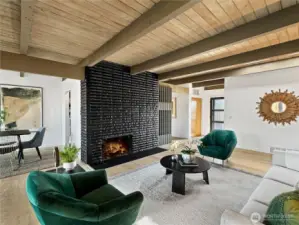 You'll find wood paneled ceilings throughout this home with powerful wood beams to lead your eye.