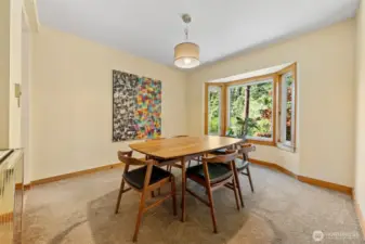 Spacious dining room has ample space for a buffett....
