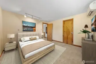 Primary bedroom is virtually staged
