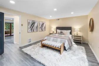 One of two upstairs bedrooms, this one is on the front side of the home. The upstairs bedrooms are exceptionally spacious, easily accommodating a king-size bed along with large dresser drawers while still leaving plenty of open floor space.