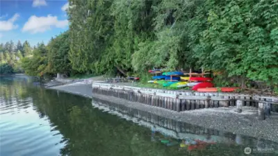 Literally across the street, the trail and gated road lead you to the private neighborhood boat launch, beach, BBQ area and kayak storage on the Sound. Magical!