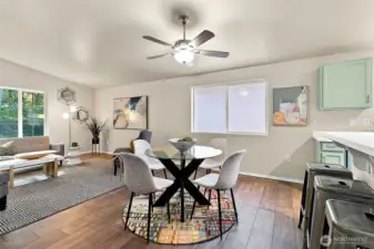The great room flows seamlessly into the dining area and kitchen, creating a true open-concept design perfect for modern living.