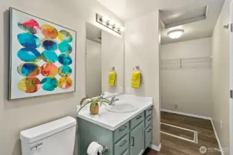 The primary suite features its own private ¾ bathroom, thoughtfully updated for both style and function, offering convenience and comfort right at your fingertips.