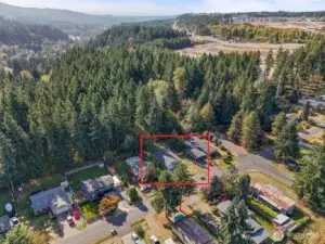 From the aerial view, you can truly appreciate this beautiful 2006-built home and its fantastic setting. The brand-new roof, fresh interior paint, and stylish new LVP flooring showcase the care and quality throughout. With ample space and convenient RV parking, this property perfectly combines modern updates with everyday functionality.