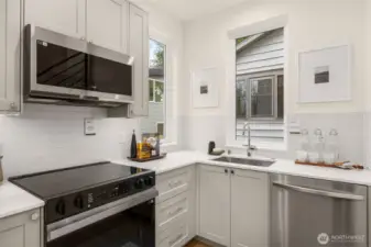 Thoughtful layout with integrated appliances and direct access to the main living areas.