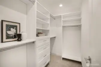 Extensive custom built-in shelving and storage solutions to keep everything organized.