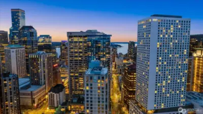 hyatt regency featuring Daniels broiler is to the right, Olive 8 hyatt is the center building feature Tidal restaurant with blue glass and to the left is the Grand Hyatt- all three of these HYATTS are owned by a local family and keep the highest standard of quality and luxury hotels.