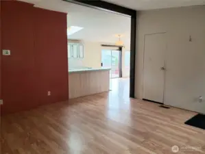 Another View of the Living Room Looking into the Kitchen and Second Living Room.