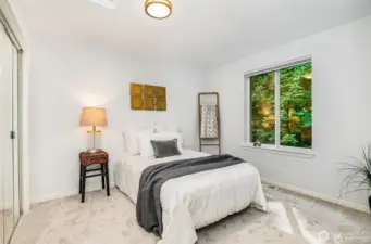 Upper level bedroom is off of loft area and next to guest bath.