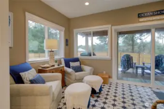 200 SF sunroom addition with custom tile flooring added by the builder is the perfect place to relax and unwind