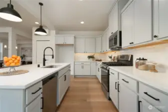 Gas range, microhood & dishwasher included - Pics are of a different 2389 Kyler plan home. Features and colors may differ.