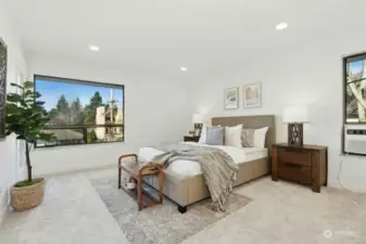 Primary bedroom with natural light throughout the day.