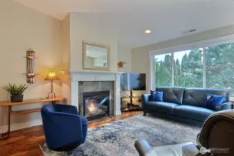 Living area is roomy, bright and cheerful. Gas fireplace for cozy evenings