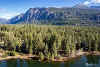 Incredible Mountain landscape surrounds Lot B at Wilson Ranch, Early Winters. Rare offering of a Lakeside Lot.