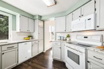 The formal dining space flows easily into the kitchen.