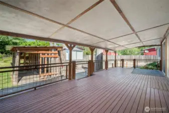 Enjoy quiet mornings with your coffee or host family and friends for a BBQ on this large deck.