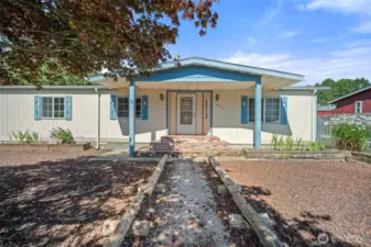 Inviting walkway leads to the front door.