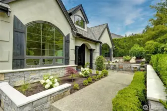 Exceptional curb appeal meets timeless design in this beautifully updated Sammamish home. Featuring a spacious garage, manicured landscaping, and a stately entryway, this property exudes elegance.