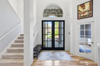 Entryway and home office to the right.