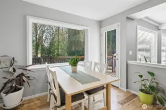 Eat-in kitchen and door out to the expansive back deck.