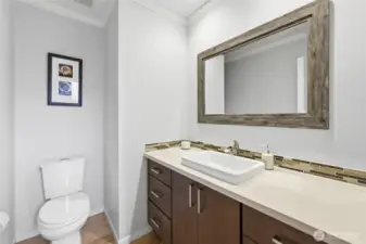 Main floor half bathroom for guests.