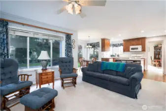 Abundant windows fill the space with natural light, creating a bright and inviting atmosphere throughout.