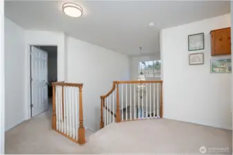 Upstairs offers bedrooms, additional living areas, and plenty of natural light for comfort and functionality.